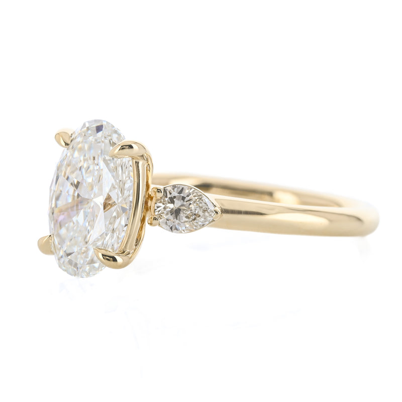 2.03CTW Oval + Pear Lab Grown Diamond Three Stone Engagement Ring - 14K Yellow Gold