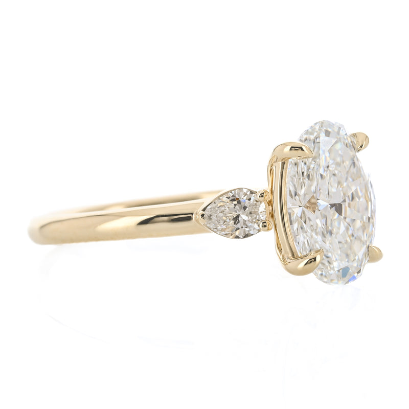 2.03CTW Oval + Pear Lab Grown Diamond Three Stone Engagement Ring - 14K Yellow Gold