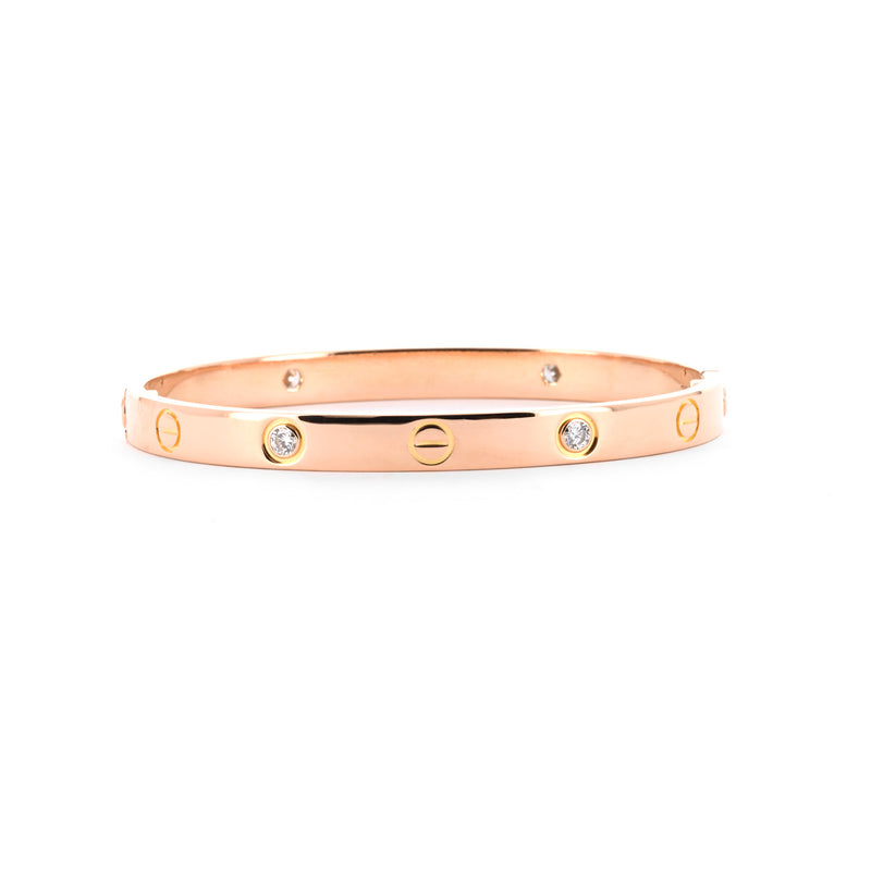 Cartier | 0.42ctw Cartier Love Ring, 4 Diamond, Size 5.75 - 18K