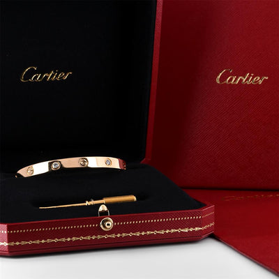 Cartier | 0.42ctw Love Bracelet, 4 Diamond, Size 17 - 18K Yellow Gold