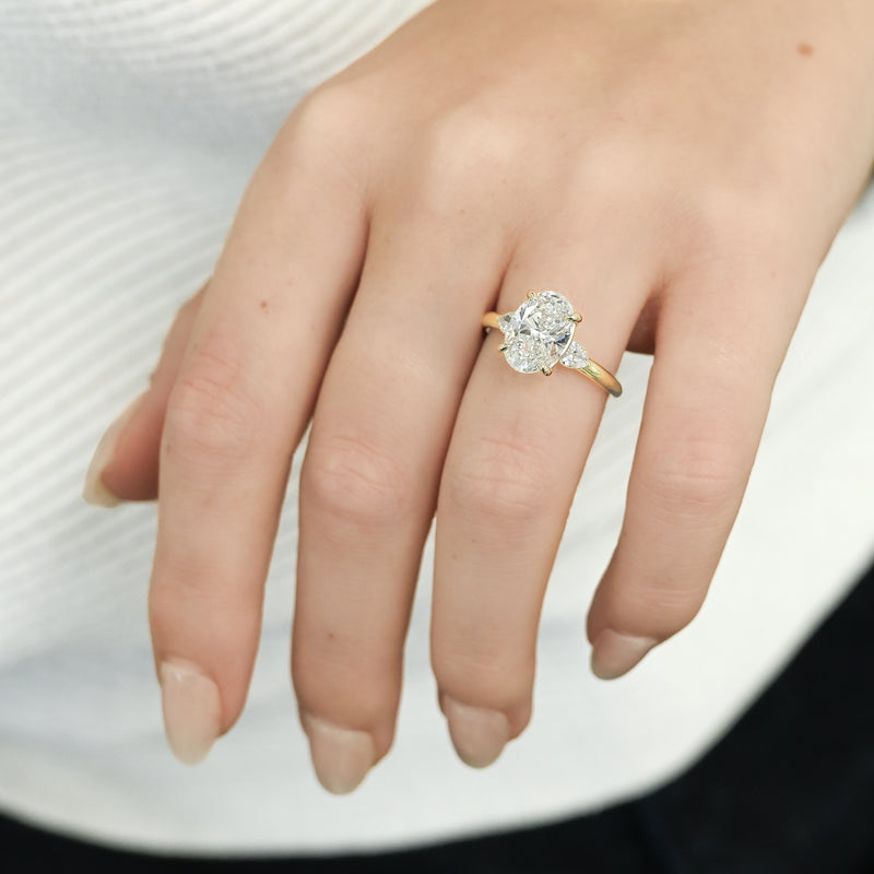 2.03CTW Oval + Pear Lab Grown Diamond Three Stone Engagement Ring - 14K Yellow Gold