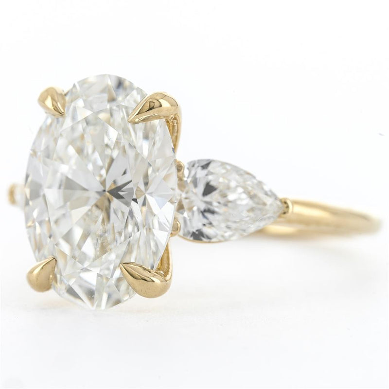 5.07ctw Oval Lab-Grown Diamond Three Stone, Size 6.5 – 14K Yellow Gold