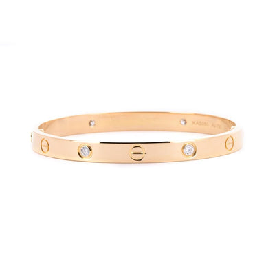 Cartier | 0.42ctw Love Bracelet, 4 Diamond, Size 17 - 18K Yellow Gold