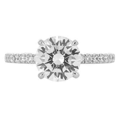 Image of round diamond engagement ring with split collar and pave band in white gold | Buchroeders Jewelers