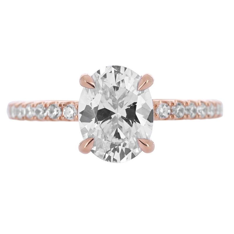 Image of diamond engagement ring with collar halo and pave band in rose gold | Buchroeders Jewelers