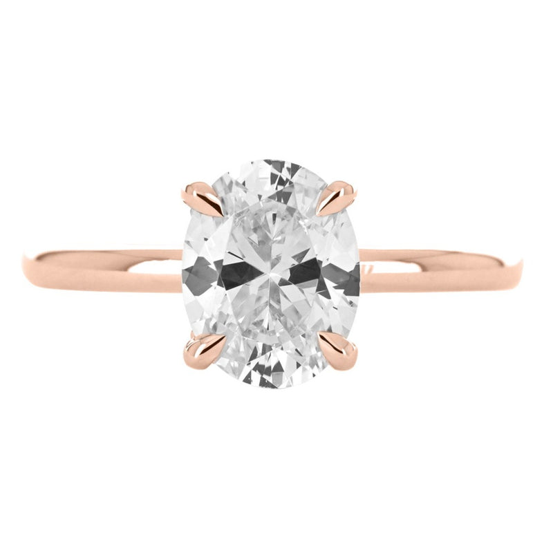 Image of oval diamond engagement with split collar halo in rose gold | Buchroeders Jewelers