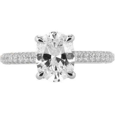 Image of oval diamond engagement ring with hidden halo and pave band in white gold | Buchroeders Jewelers in Columbia MO 