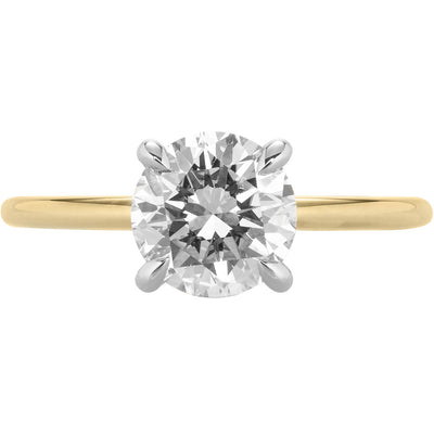 Image of round solitaire diamond engagement ring with hidden halo in yellow gold | Buchroeders Jewelers
